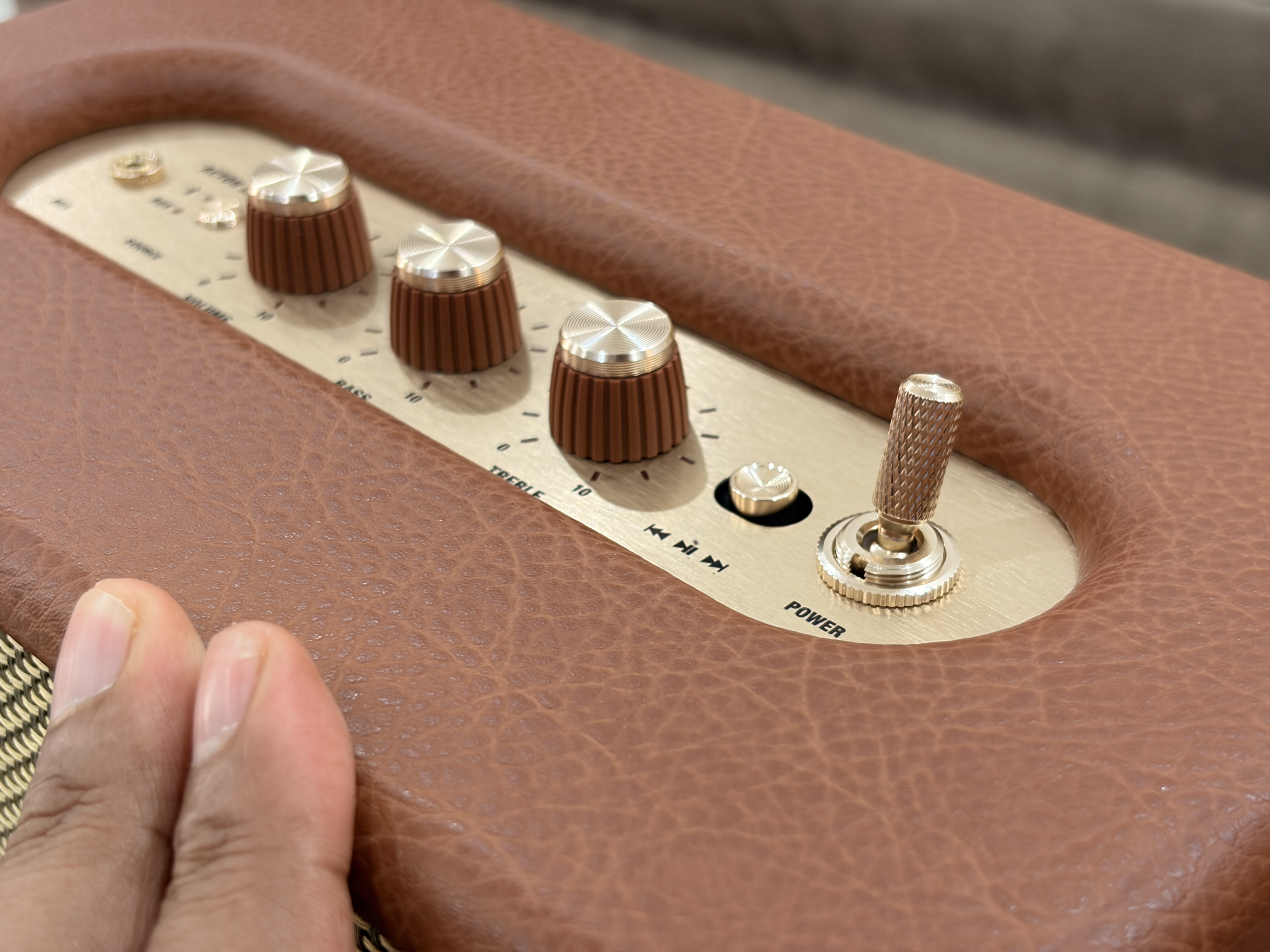 Marshall Acton III power toggle and treble knob close-up